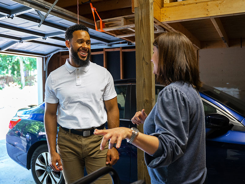 Junk Removal Expert with Client